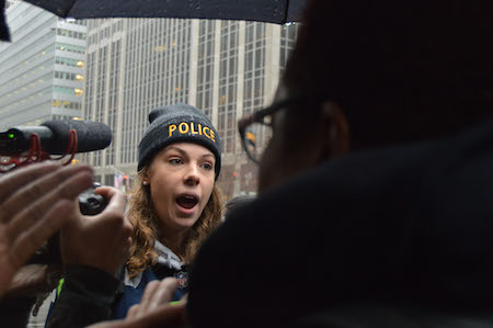 April Bedunah makes her pro-police points in debate with a swarm of pro-Beyoncé activists. | JACKSON CHEN