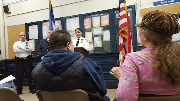 NYPD Lauds Local for Subway Bravery 1 At the podium: Deputy Inspector Michele Irizarry, Commanding Officer of the 10th Precinct, recounted the capture of a local con artist before giving her monthly summary of crime statistics. Photo by Lucas Ropek.