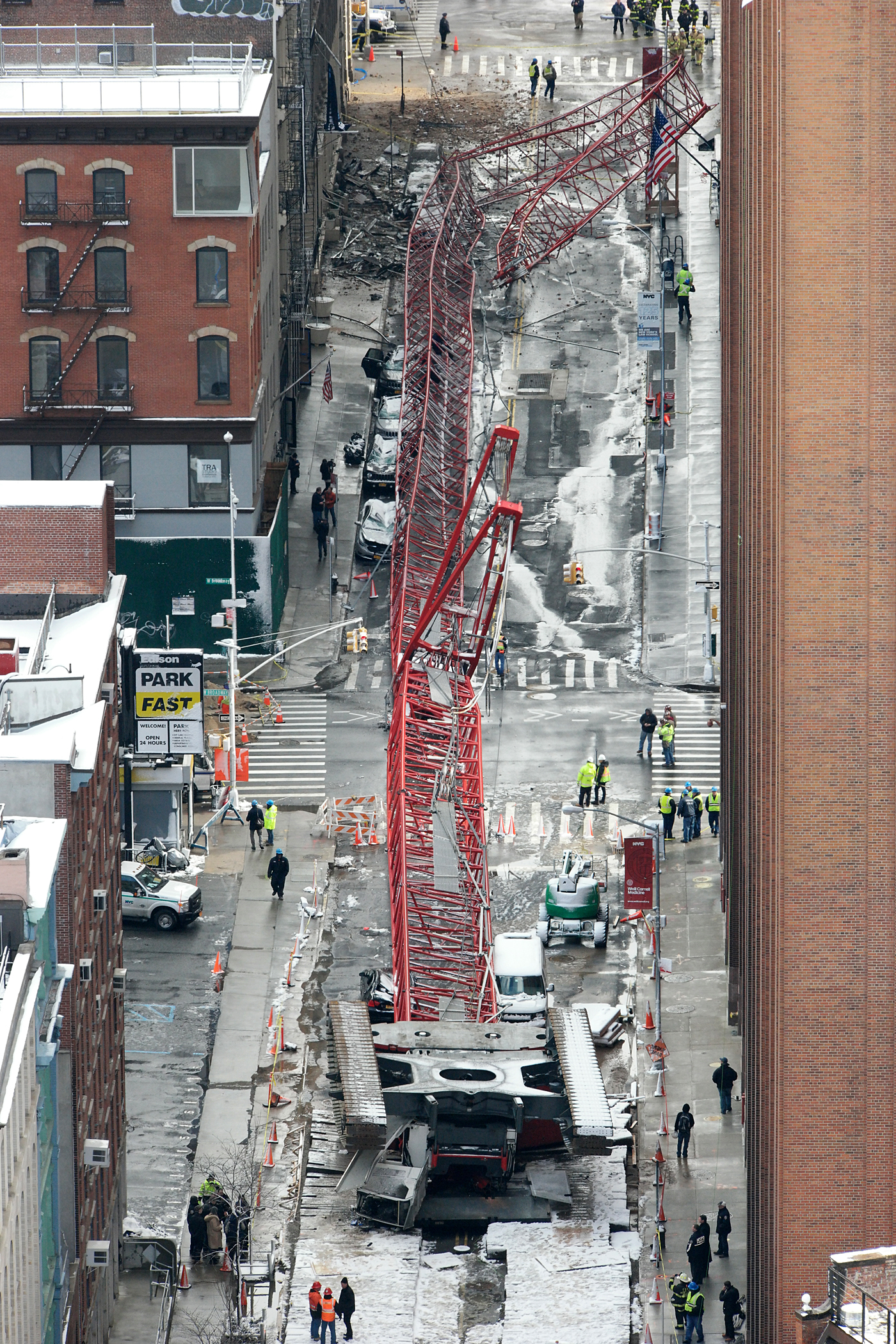 Photo by Milo Hess The 565-foot crane crashed down along two blocks of Worth St. between Hudson and Church Sts. in February.