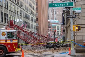 Photo by Tequila Minsky Falling debris knocked loose by the toppling crane injured three passers by, one seriously.