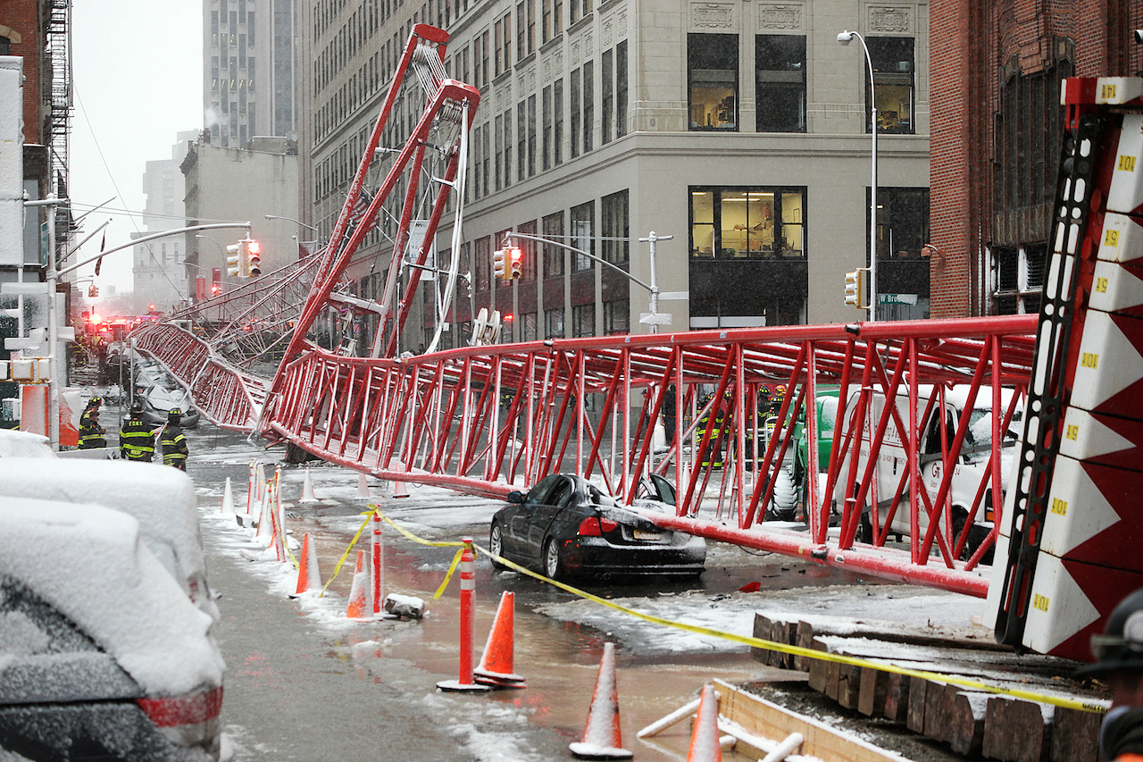 The huge crane crashed down onto two blocks of Worth St. One man was killed.  Photo by Milo Hess