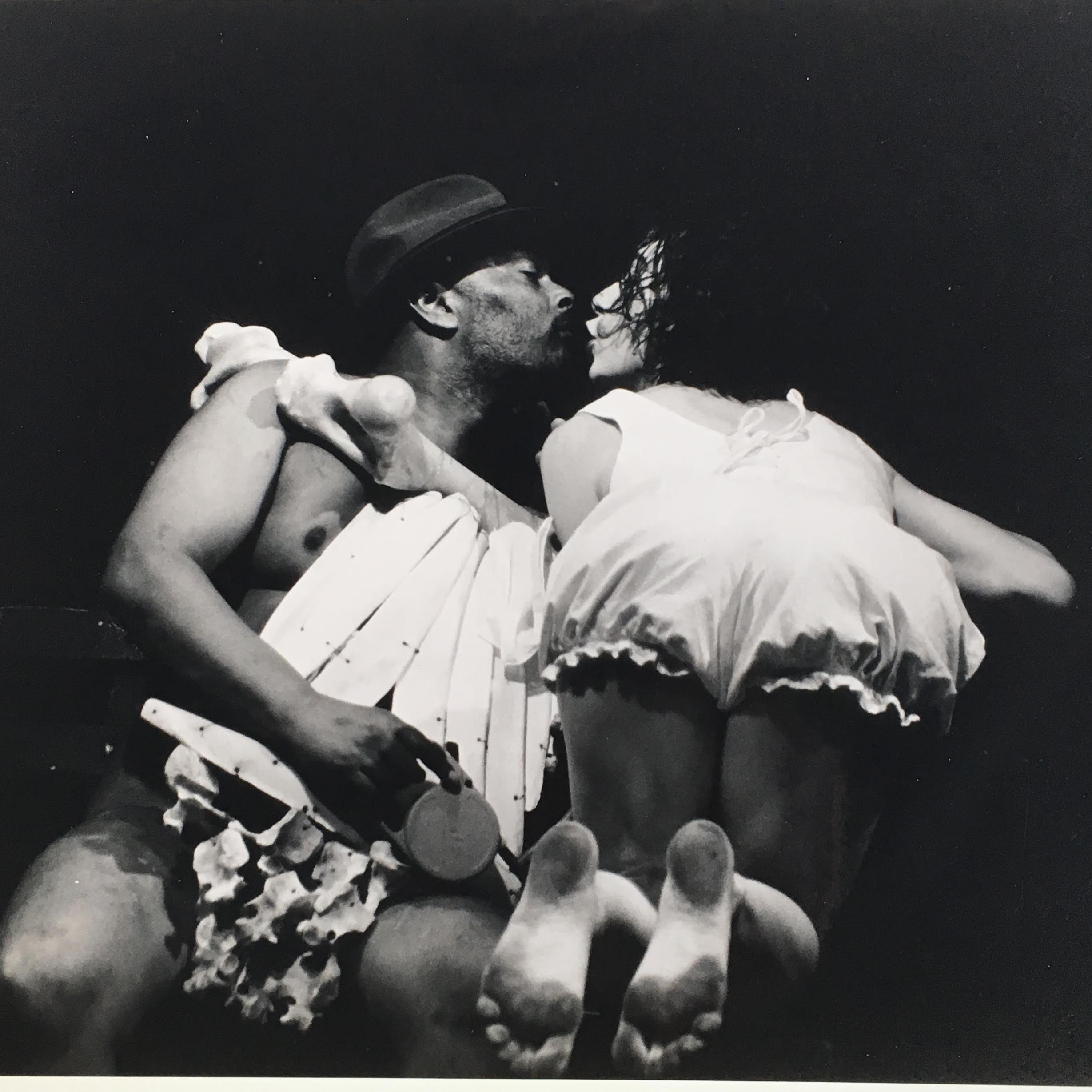 John Farris in a heavy costume of bones in “Barkelot,” a feminist performance piece.