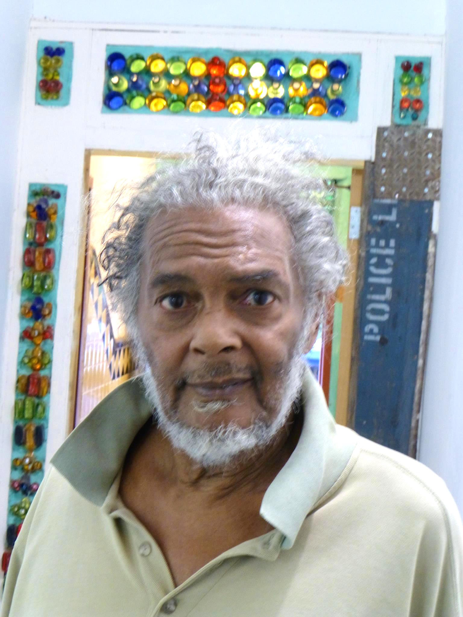 John Farris in a recent photo in the vestibule at Bullet Space, a former squat on E. Third St.  Photo by Maggie Wrigley