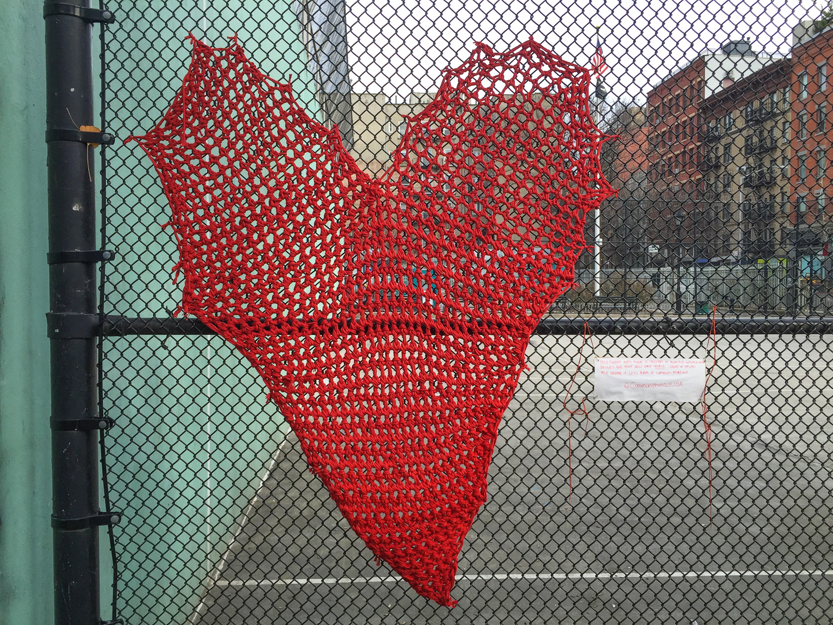 A crocheted heart left on the fence on Passannante Ball Field's Sixth Ave. side before Valentine's Day.   Photo by Tequila Minsky