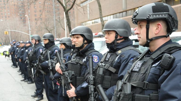 Bratton, Schumer, de Blasio: Restore $90M anti-terrorism funding 2 Members of the NYPD's terror task force stand by at Feb. 17, 2016, news conference at One Police Plaza.