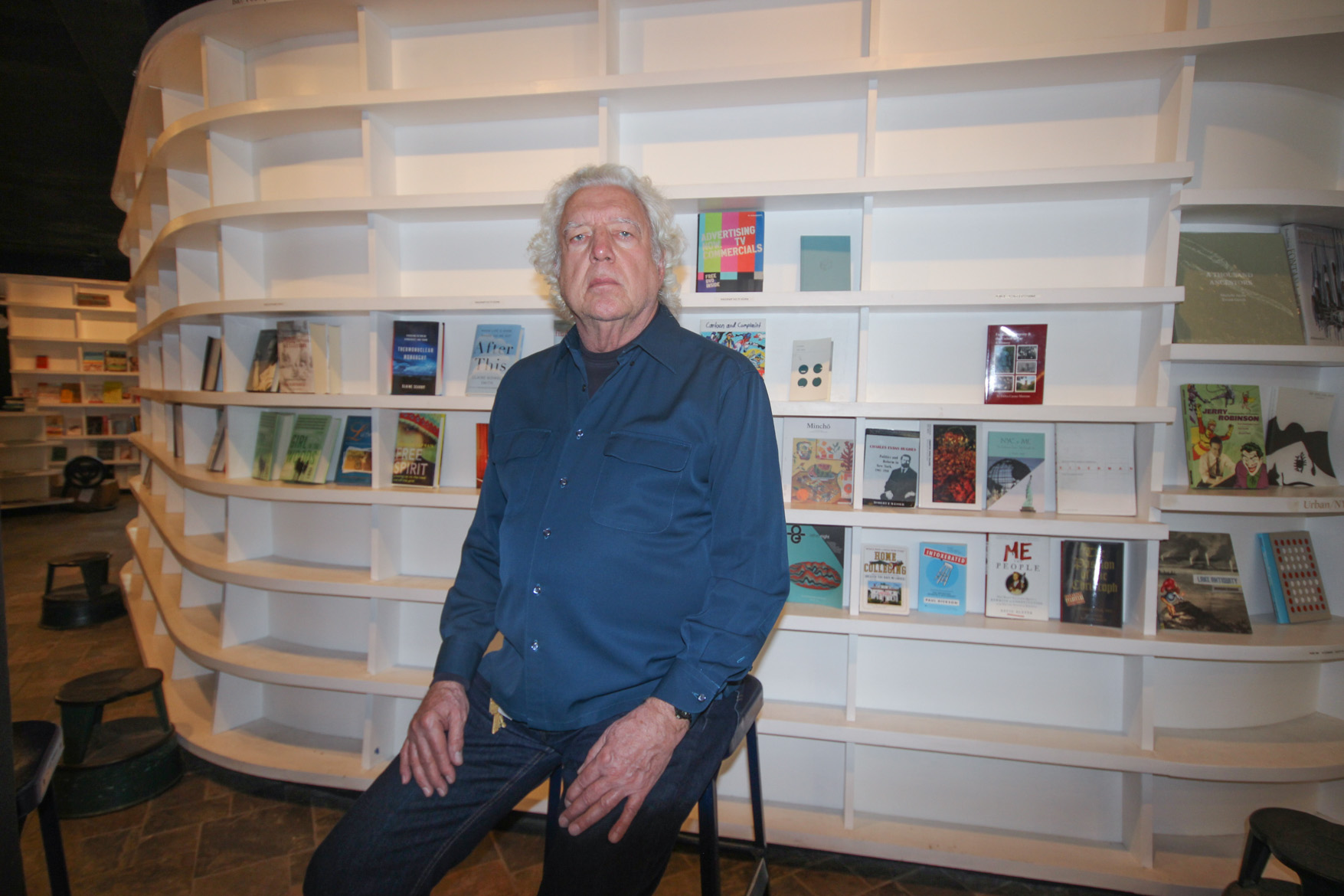It’s a closed book: St. Mark’s Bookshop is going out of business 1 St. Mark’s Bookshop owner Bob Contant this past Tuesday in front of mostly barren shelves at the E. Third St. store. The store is holding a 50 percent clearance sale. Asked by the photographer if he had any “parting words,” he paused for a second, chuckled and said, “To books and reading.” Photo by Tequila Minsky