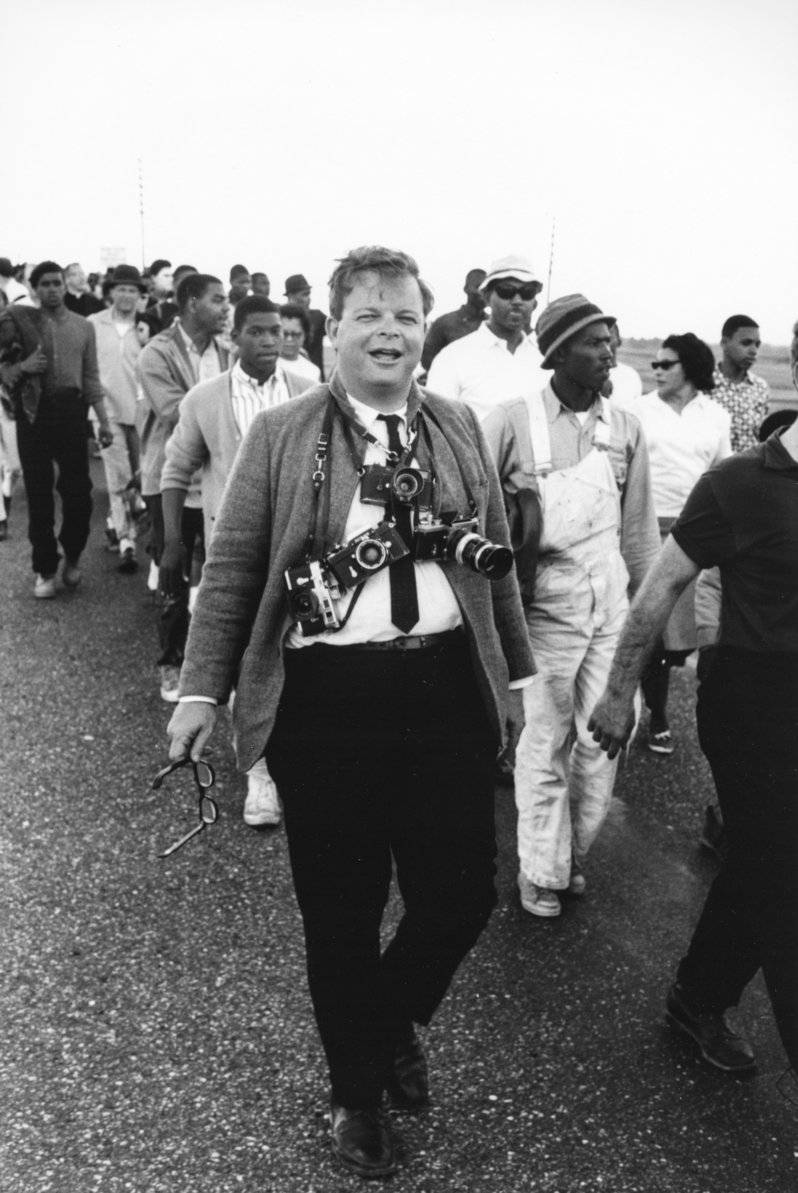 Bob Adelman with marchers in Lowndes County. Selma to Montgomery March. 24th March, 1965.
