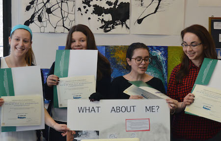 Smith School Students Employ Imagination in Kicking Butts 1 Allison Block, a teacher at the Smith School, joins the three students in her advisory group –– Rachel Mitchell, Samantha Zachar, and Maddy Tuten –– in showing their winning certificates from NYC Smoke-Free, signed also by the school and Councilmember Helen Rosenthal. | JACKSON CHEN