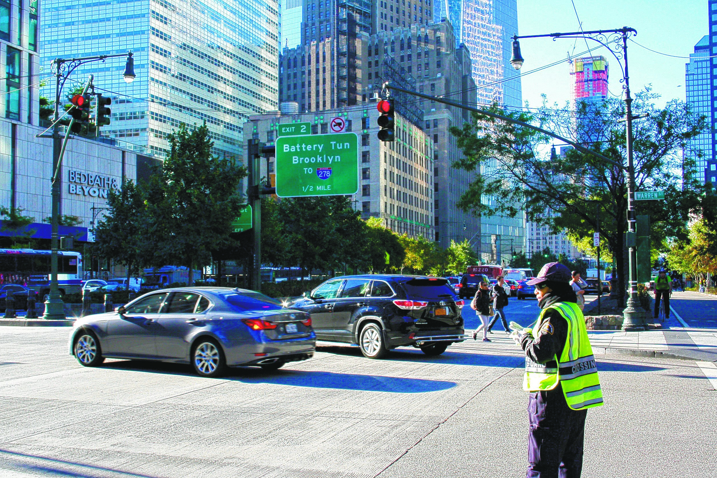 Photo by Yannic Rack Crossing guards can be hard to spot in Lower Manhattan, which has long suffered from a chronic shortage, but a new agreement with the NYPD promises that nine police officers and traffic enforcement agents will be permanently stationed at intersections around eight Downtown schools until new crossing guards are hired to fill the gap.