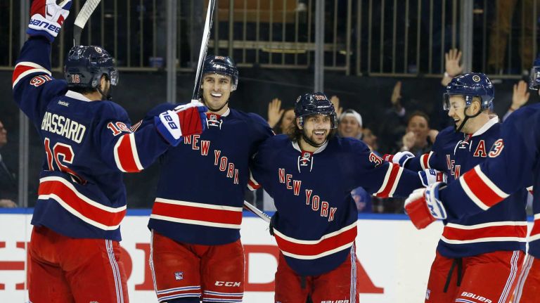 Mats Zuccarello #36 of the New York Rangers celebrates his first-period goal against the Boston Bruins with teammates Chris Kreider #20, Derick Brassard #16 and Derek Stepan #21 at Madison Square Garden on Wednesday, March 23, 2016.