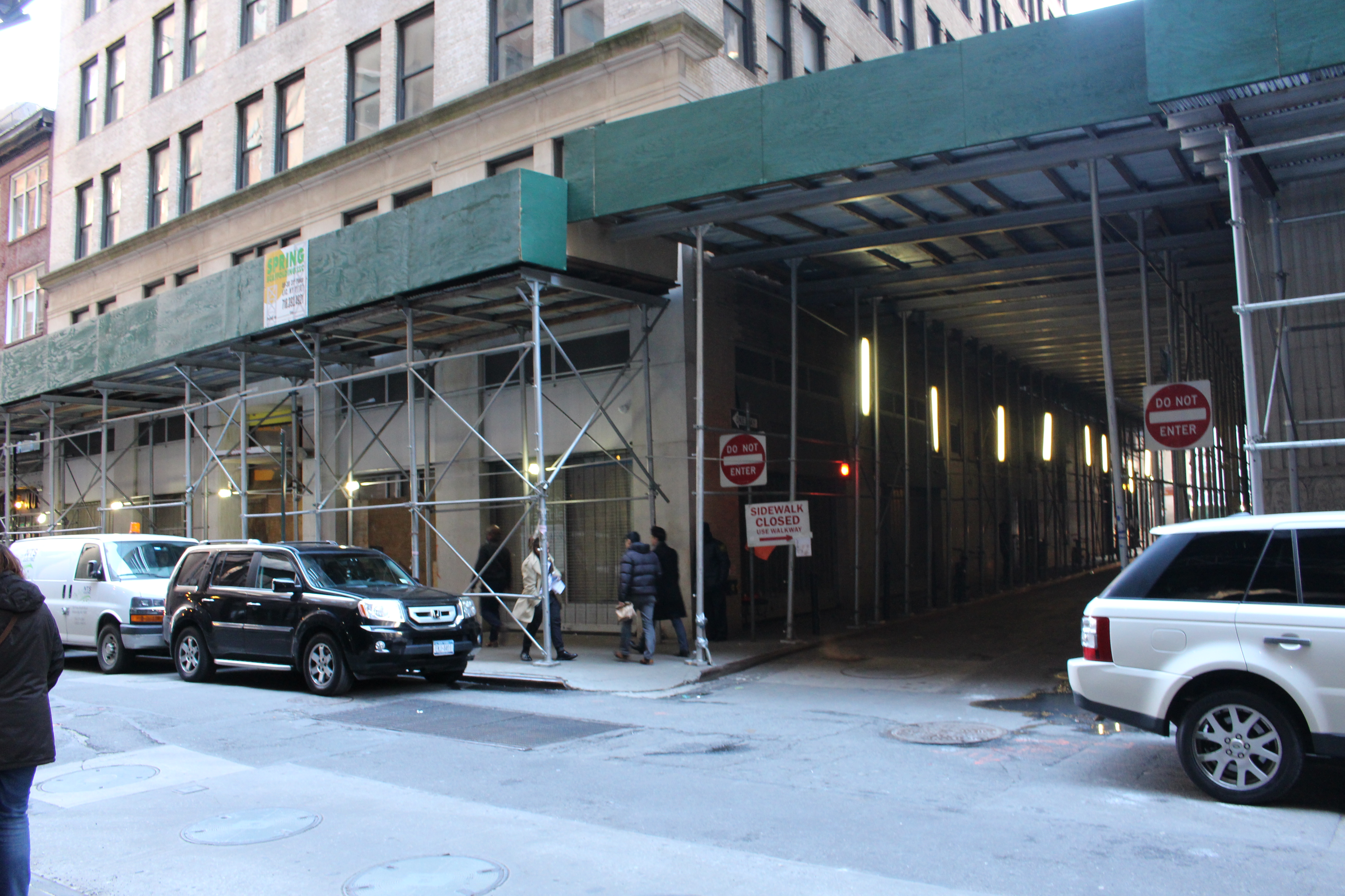 Downtown’s most notorious sidewalk shed may soon be coming down from 45 John St. 1 Photo by Bill Egbert The long-standing scaffolding wraps around the corner from 45 John Street onto Dutch St., a dark and narrow passage that creates a shadowy haven for indigent addicts, neighbors say.