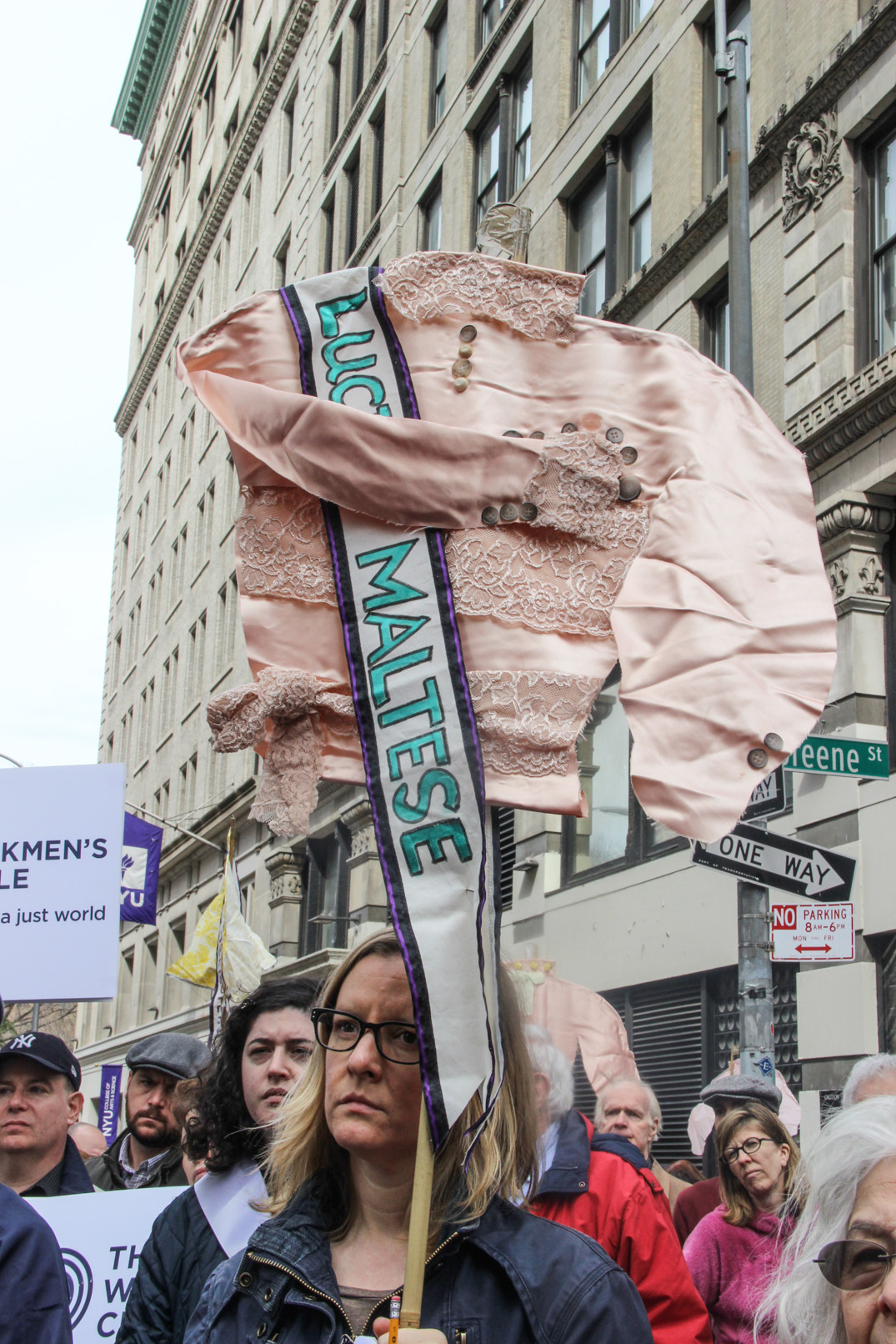 At last week’s anniversary memorial service for the Triangle Shirtwaist Fire, some of the participants held up blouses with sashes emblazoned with the victims’ names.  Photos by Tequila Minsky