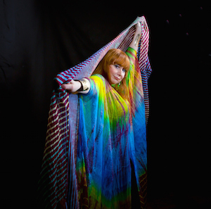 Swaddled, festooned and seemingly spacey, Carol Lipnik is a disciplined artist in full command of her considerable abilities — and her enraptured audience. Photo by Albie Mitchell.