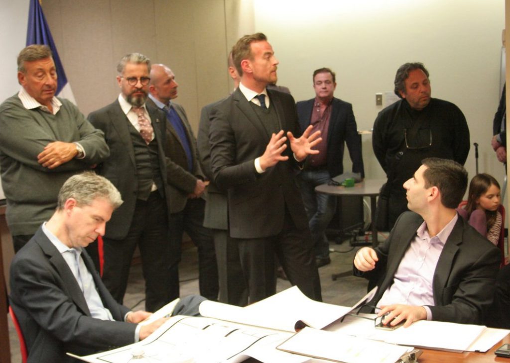 Photo by Yannic Rack Nicolas Barthelemy, center, who will be the restaurant’s director of operations, gestures as he tries to convince skeptical residents that the proposed Tribeca Buddha Bar would be a good neighbor, while neglecting to mention that he was part of the team running the global brand's disastrous foray into the Meatpacking district when it lost its franchise due to complaints from locals.