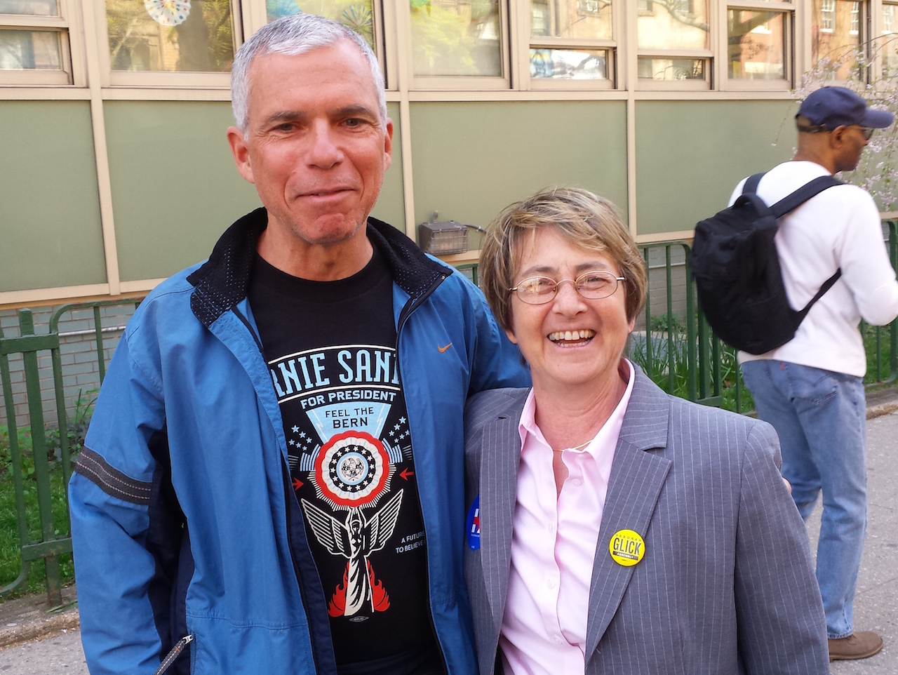 Despite their political differences, Clinton booster Assemblymember Deborah Glick, right, and Sanders backer Leo Weinberger could still pose for a photo together. Weinberger, who is registered as an independent, could not vote in the Democratic primary, but wore his Sanders T-shirt to show support.  Photo by The Villager 