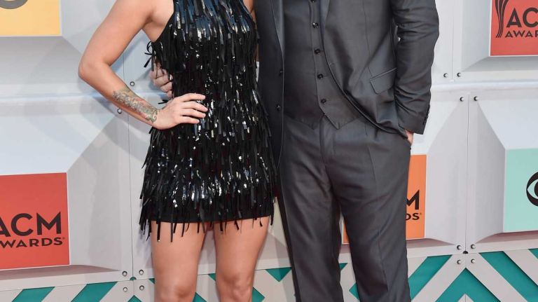 Cassadee Pope and Chris Young arrive for the 51st Academy of Country Music Awards at MGM Grand Garden Arena in Las Vegas on Sunday, April 3, 2016.
