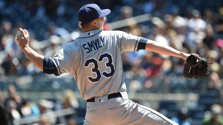 Yankees vs. Rays 66 Tampa Bay Rays starting pitcher Drew Smyly delivers a pitch against the New York Yankees during the first inning of an MLB baseball game at Yankee Stadium on Sunday, April 24, 2016.