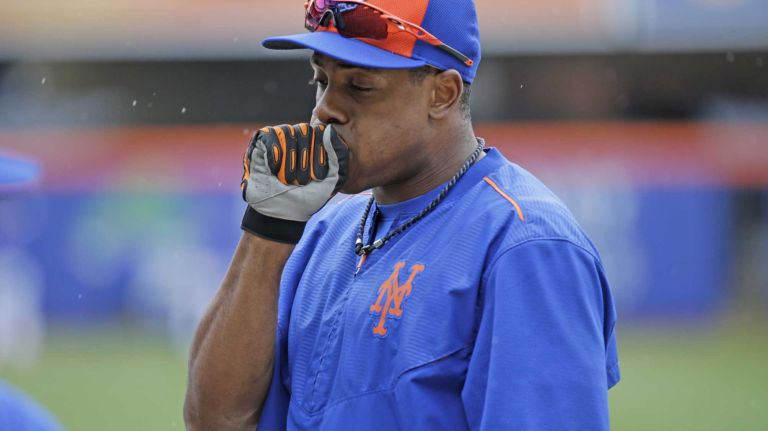New York Mets rightfielder Curtis Granderson, No. 3, looks on during batting practice before the Mets' home opener against the Philadelphia Phillies on Friday, April 8, 2016 at Citi Field.