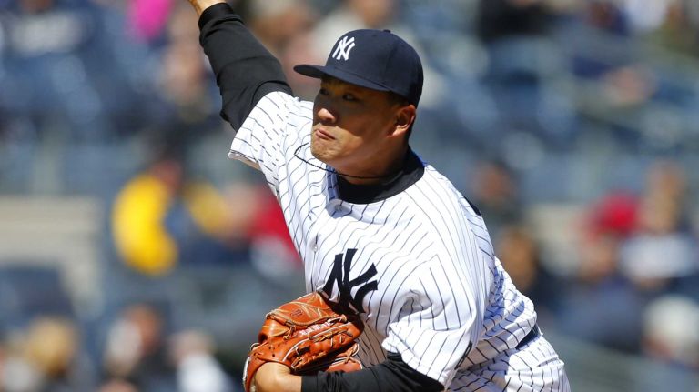 Opening Day: Yankees vs. Astros 42 Masahiro Tanaka #19 of the New York Yankees pitches in the second inning against the Houston Astros on Opening Day at Yankee Stadium on Tuesday, Apr. 5, 2016 in the Bronx Borough of New York City.