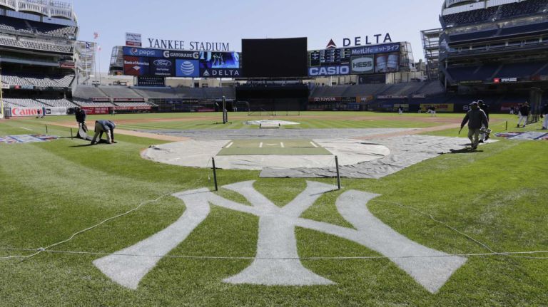 Opening Day: Yankees vs. Astros 65 The filed is all clear as the grounds crew prepares New York Yankees Opening Day against the Houston Astros Tuesday, April 5, 2016 at Yankee Stadium.