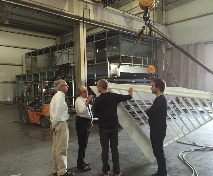 AIDS Memorial supporters are the community, too 2 Two members of the Argentinian fabricating company, at left, confer with the memorial’s architects, Esteban Erlich and Mateo Paiva, both of Studio A+I.