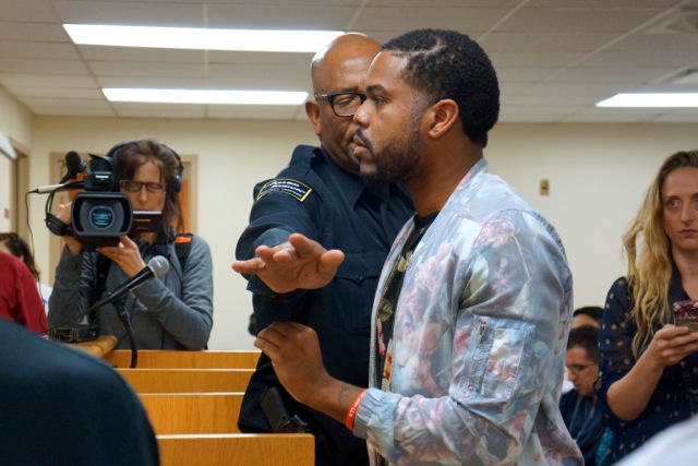 Army vet Nico House was led out by security after cussing out the B.O.E. commissioners.  Photo by Sarah Ferguson