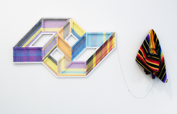 A tactile thread runs through it 1 Adrian Esparza: “Skyscape 2” (2014. Wood, paint, nails, serape. 42 x 72 inches.). Image courtesy the artist and Cindy Rucker Gallery.