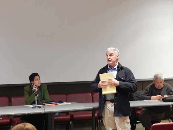 CB4 Fumes at Port Authority Bus Terminal Project 3 Tom Cayler (right) thanks CB4 Chair Delores Rubin (left) for her involvement in the town hall that took the “Pathetic Authority” to task. Photo by Sean Egan.