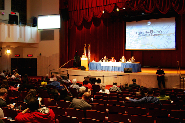 A few dozen people filled the seats at a May 12 town hall, to quiz MTA officials on the agency’s plans for repairing the Canarsie Tunnel below the East River. Photo by Yannic Rack.