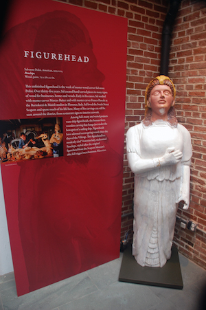 A ship’s figurehead by master carver Sal Polisi is one of the highlights of “Street of Ships: The Port and Its People,” on view through 2016. Photo courtesy South Street Seaport Museum. 