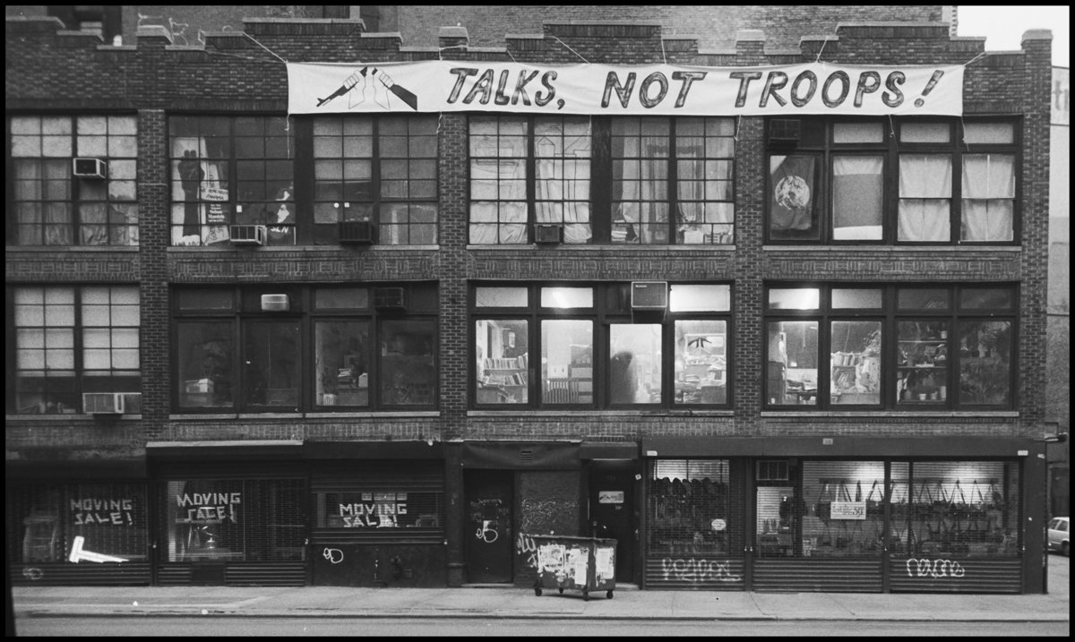 In 1991, an anti-Gulf War banner hung from 339 Lafayette St. In June 1982, just before the No Nukes March in Central Park, the top of the building was draped in black bunting. Photo by Ed Hedemann