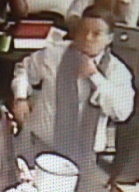 A surveillance camera image of the alleged serial bag and laptop swiper.