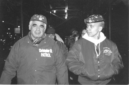 David Poster, president of the Christopher St. Patrol, left, on the beat with members of the Guardian Angels and other patrol members.  Villager file photo