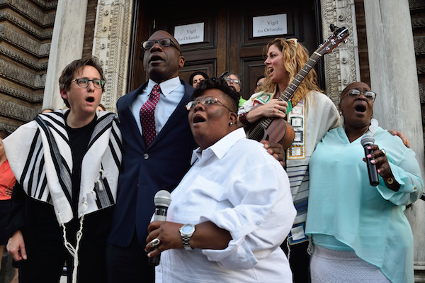 CBST’s Rabbi Sharon Kleinbaum, Reverend Fred Davie of the Union Theological Seminary, and Reverend Vanessa Brown of the Rivers of Living Water singing “We Shall Overcome.” Photo by Donna Aceto.