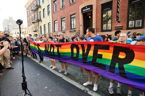 West Village Vigils Send Messages of Hope 1 The June 12 Stonewall vigil emphasized the ongoing battle against anti-LGBT bigotry. Photo by Donna Aceto.