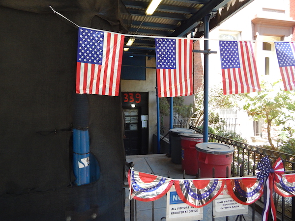 American flag decorations, in honor of Juneteenth, hung outside the front door of the Hopper-Gibbons House in preparation for the rally. Photo by Sean Egan.