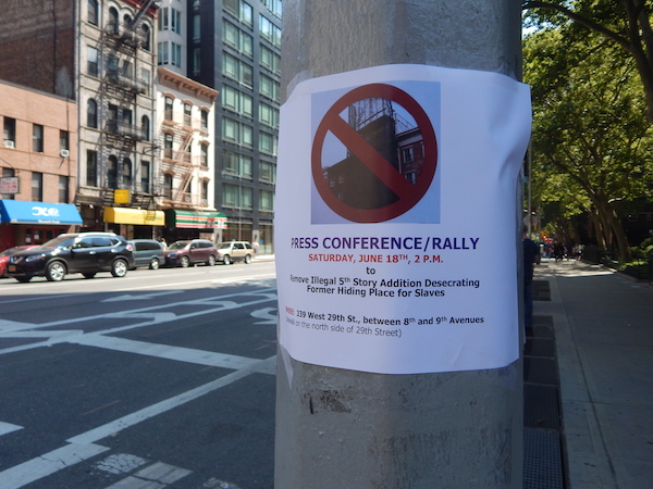 A sign on the corner of W. 29th St. & Eighth Ave., providing details on the June 18 rally for the Hopper-Gibbons House. Photo by Sean Egan.