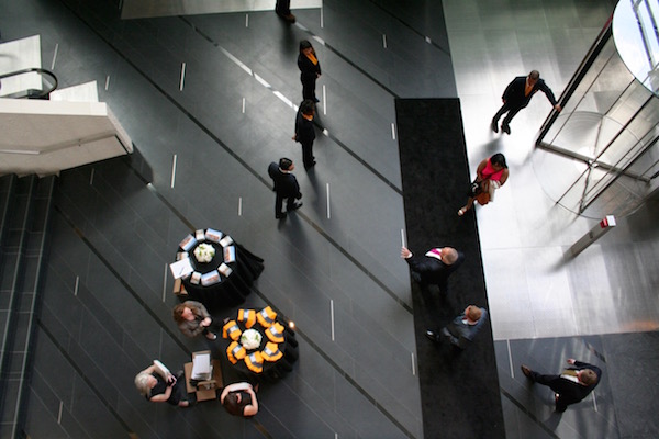First Tenant Fills Hudson Yards Tower 9 In the base of the building’s 15-story atrium, the workers could pick up a “Field Guide” to get familiar with the neighborhood — even though Coach itself has been based in the area for 50-plus years. Photo by Yannic Rack.