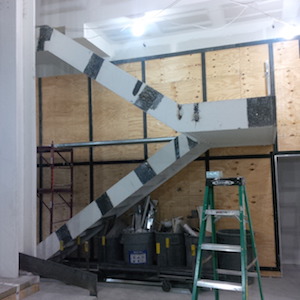 Back in Chelsea, Irish Rep makes a play for home 3 A staircase takes visitors to the newly installed balcony (in a later phase of its construction, wire mesh further contributes to the theatre’s newfound sense of open space). Courtesy Irish Rep.