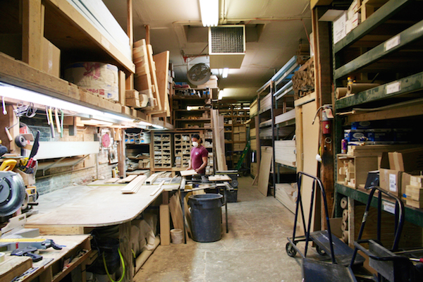 A Midtown Lumber employee labors over a custom order in the workshop just beyond the store’s main showroom. Photo by Yannic Rack. 
