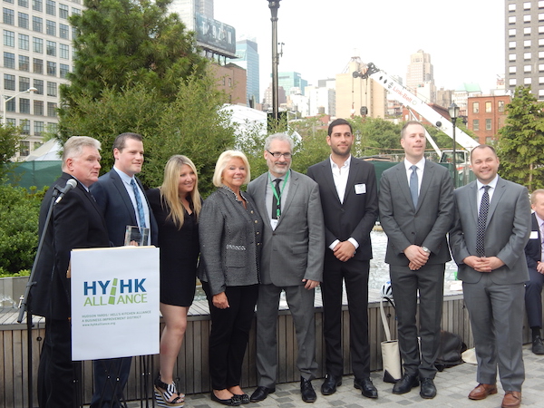 BID Takes Care of Business on Burgeoning Boulevard 1 L to R: Alliance Chair Kevin Singleton, the family of Oskar Brecher, Alliance Executive Director and President Robert Benfatto, Mitchell Moinian, Mark Spector, and City Councilmember Corey Johnson. Photo by Sean Egan.
