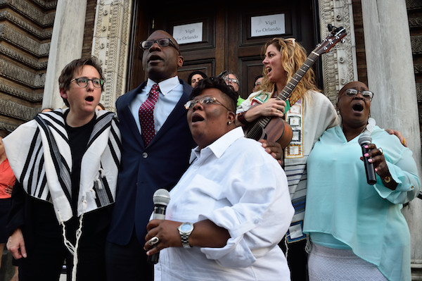 CBST’s Rabbi Sharon Kleinbaum, Reverend Fred Davie of the Union Theological Seminary, and Reverend Vanessa Brown of the Rivers of Living Water singing “We Shall Overcome.”  DONNA ACETO