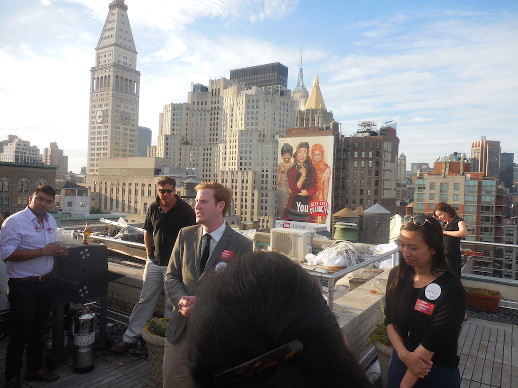 Dodge Landesman speaking at the kickoff for his campaign for Democratic State Committee in the 65th Assembly District. At right is his political ally Yuh-Line Niou, who is running for the district’s Assembly seat. Photo by Sharon Woolums 