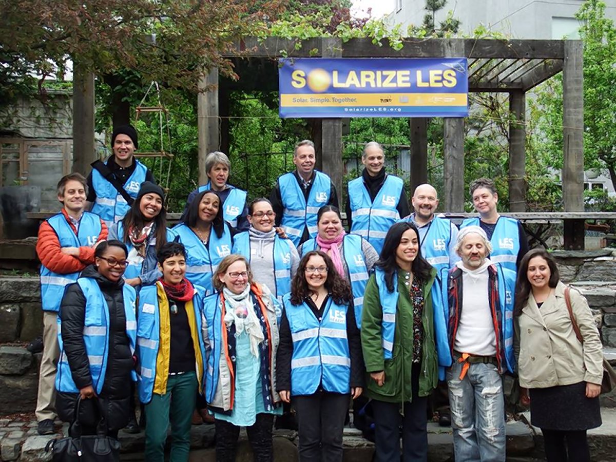 Members of LES Ready! — a coalition focused on emergency preparedness and resiliency formed after Superstorm Sandy — at the launch of Solarize LES last month in La Plaza Cultural, at E. Ninth St. and Avenue C. Among those pictured are, back row, from right, Paul Garrin, head of WiFi-NY, and Steve Herrick, executive director of the Cooper Square Committee; second row, far left, Chris Neidl, director of Solar One; third from left, activist Ayo Harrington; and third from right, Damaris Reyes, executive director of Good Old Lower East Side (GOLES); front row, third from right, District Leader Carlina Rivera.