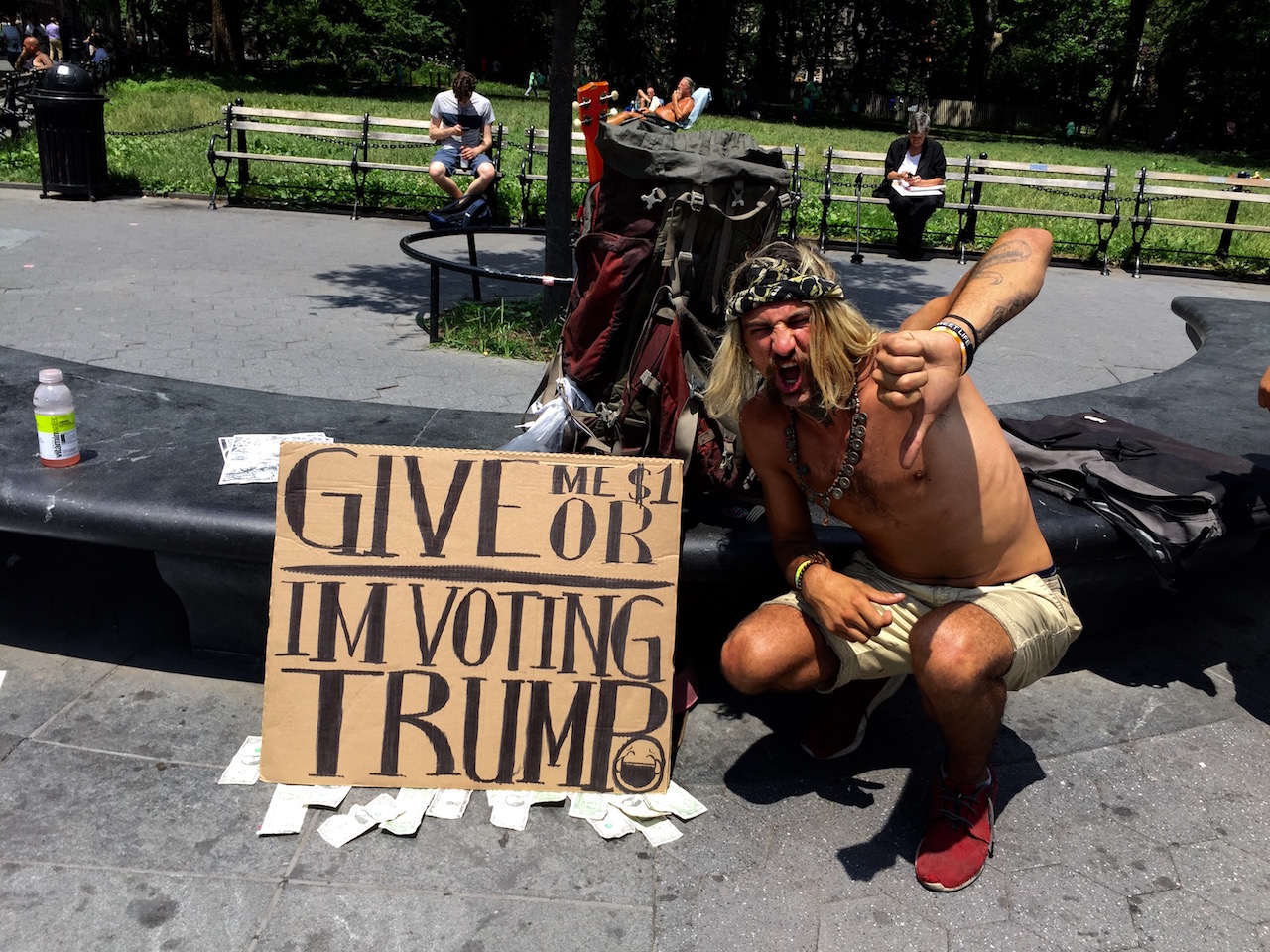 The Donald might appreciate this Washington Square Park panhandler’s entrepreneurial spirit. Photo by Tequila Minsky 