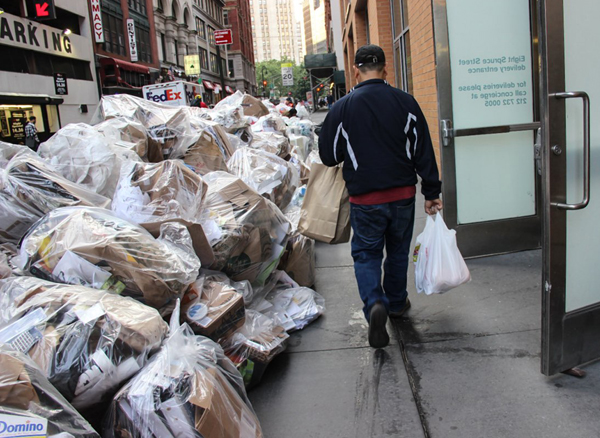 Photos by Tequila Minsky Downtowners complain that sharing the area’s narrow sidewalks with growing piles of refuse is hurting their quality of life. 