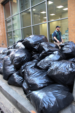 Photo by Tequila Minsky Mountains of garbage bags like this one outside 8 Spruce St. will become an ever more common fixture of Downtown sidewalks if the current residential boom continues apace.