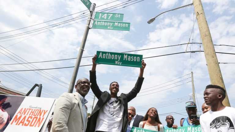 Anthony Mason, Jr.,and other family members at the street naming ceremony for the late New York Knicks player, Anthony Mason, at 147th Street and Rockaway Blvd., in South Jamaica, Queens, Saturday, June 11, 2016. 