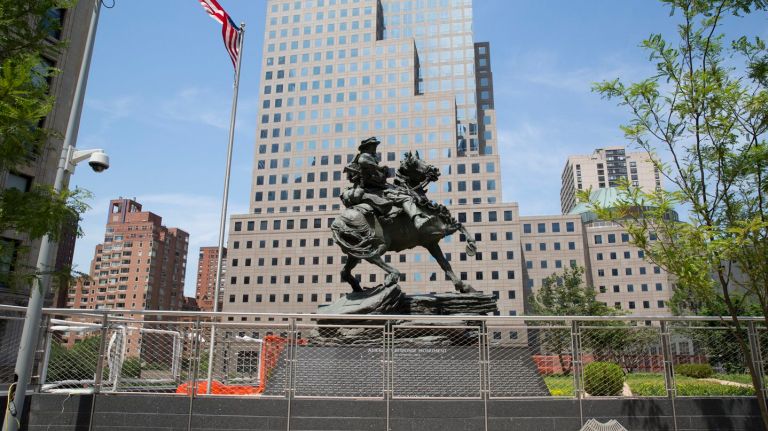 The new Liberty Park, seen here on Monday, June 20, 2016,  will be home to 'America's Response,' a bronze sculpture depicting a modern Army Special Forces soldier on horseback. The park is expected to open next week and leads to the doors of the new St.  Nicholas Church.