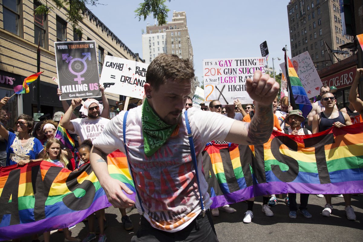 Tragedy of Orlando, trashing of guns, triumph of Stonewall Monument mix at an emotional Pride 10 New York City’s Gay Pride Parade drew millions on June 26th, Sunday in a celebration of LGBT’s identity pride and in the tribute to the June 12th Orlando terror victims of the Pulse Gay Nightclub. Hillary Clinton, the presumptive Democratic presidential nominee, joined the march for a few blocks in an unannounced surprise appearance, alongside New York Governor Andrew Cuomo, New York City Mayor Bill de Blasio, and Al Sharpton. The security was extremely hight and NYPD’s special task forces with M-16 were very visible.
